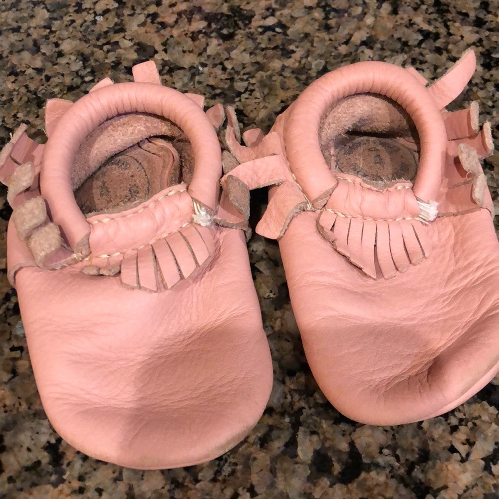 Well loved pink Freshly Picked Moccasins